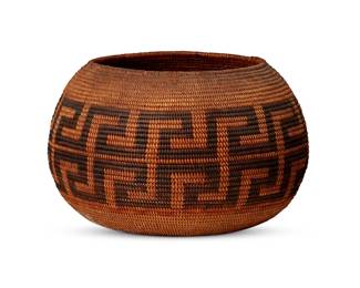 116
A California Mission basketry bowl
Early 20th century; Southern California
The coiled bowl with banded stacked meandering motifs to center of body
6" H x 9.375" Dia.
Estimate: $600 - $800