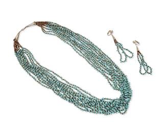 344
A set of Southwest Pueblo turquoise and shell jewelry
Mid/late 20th century
Comprising a delicate ten-strand necklace with fine turquoise nuggets, fine heishi shell spacers, and a silver cone clasp, together with a pair of matching double-strand earrings, 3 pieces
26 1/2" L; earrings: 3 1/2" L
119.5 grams gross
Estimate: $400 - $600