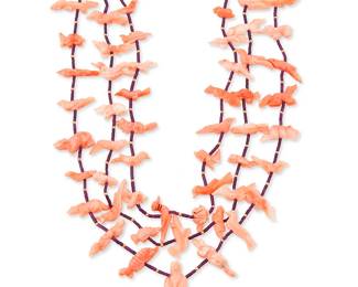 320
A Southwest Pueblo carved pink coral fetish necklace
Late 20th century
A delicate three-strand sugilite bead necklace with graduated carved pale pink coral animals including birds, turtles, and bears, and with 14k gold spacers
27 1/2" L
68.4 grams gross
Estimate: $200 - $400