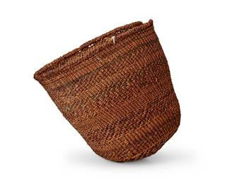 164
A San Carlos Apache polychrome berry basket
Early 20th century; Arizona
The twined berry/burden basket with banded red and brown accents
9.75" H x 9.5" W x 9" D
Estimate: $300 - $500