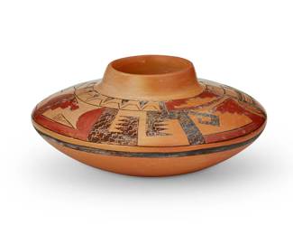 254
Karen Kahe Charley (b. 1951, Hopi-Tewa)
A polychrome yellowware jar, late 20th century
Signed to underside: [artist's cipher] / K K C
The three-color vessel with broad shoulder and pronounced rim, featuring stepped, bird, and geometric motifs to shoulder
3" H x 7" Dia.
Estimate: $300 - $500