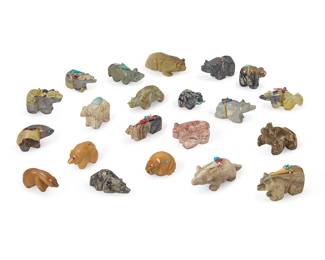 354
A group of Zuni carved stone bear fetish figures
Mid/late 20th century
Most variously signed by the artist or marked: Zuni
Comprising twenty-one bear figures from various makers such as Carl Estate, Louise Singer, and Alex Tsethlikai, some with turquoise inlaid eyes, eleven mounted with offerings
21 pieces
Largest: 1.125" H x 3.125" W x 3.375" D
Estimate: $200 - $400