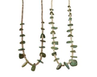 351
Two Southwest Pueblo turquoise tab necklaces
Mid-20th century
Each with graduated turquoise tabs and heishi shell bead spacers, with traditional wrapped neck cords
25 1/2" L and 25" L
126.3 grams gross
Estimate: $600 - $800