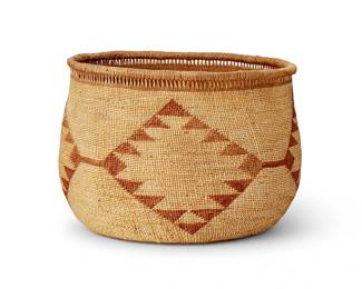 141
A large Hupa/Yurok basket
Early 20th century; Northern California
The twined basket with imbricated orange conjoined serrated diamond motifs below a row of open twisted warp and thick rim rod
9.25" H x 13.25" Dia.
Estimate: $700 - $900