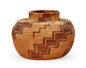 128
A Yokuts polychrome bottleneck basket
Early 20th century; Central California
The coiled vessel with spiraled red stepped motifs in a brown outline
7.125" H x 9.5" Dia.
Estimate: $1,000 - $1,500
