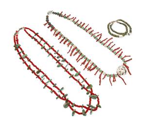 318
Two Southwest Pueblo-style necklaces
Mid/late 20th century
Comprising a double-strand red glass bead and turquoise tab necklace suspending a double turquoise and clam shell jacla, together with a green glass bead necklace with red branch coral with a central white stone nugget, 3 pieces
Larger: 29" L x 4" H; smaller: 27 1/2" L
250.0 grams gross
Estimate: $500 - $700
