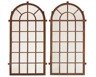 217
A pair of wrought metal framed mirror panels
Early 20th century with later elements
Each unmarked
The contemporary mirror set in a repurposed astragal wrought metal frame
2 pieces
Each: 92" H x 47" W x 2.25" D
Estimate: $1,500 - $2,000