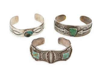287
Three Fred Harvey-style Southwest silver and turquoise cuff bracelets
Early/mid-20th century
One marked: HL [or] TH [conjoined]
Comprising three narrow ornate silver and set turquoise cuffs in various styles, and with elaborate stampwork designs and motifs including arrows, 3 pieces
Largest: 6 1/4" inner C x 7/8 " H; smallest: 6 1/8" inner C x 5/8" H
95.8 grams gross
Estimate: $200 - $400