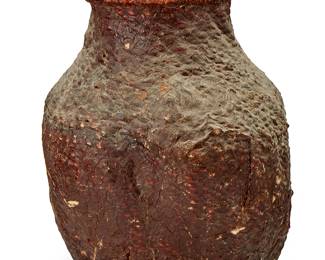 166
An Apache pine pitch water jar
Late 19th/early 20th century; Southwest United States
The coiled jar sealed with pine resin pitch, with two handles to one side
16.25" H x 14.5" W x 13.5" D
Estimate: $300 - $500