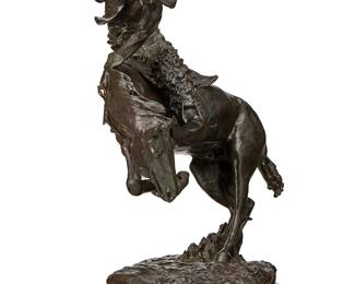 214
After Frederick Remington
1861-1909
"Rattlesnake," modeled 1905, cast 1979
Patinated bronze on a marble plinth
Signed in the casting: Frederick Remington / copyright; further marked: Heikka Foundry 79 / 21
Overall: 23" H x 17.5" W x 12" D
Estimate: $800 - $1,200