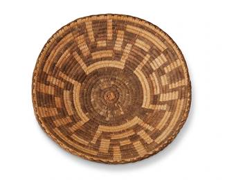 157
An Akimel O'odham/Pima basket
Early 20th century, Akimel O'odham; Southwest United States
The coiled basket with geometric motif throughout and braided rim
3.625" H x 12.5" Dia.
Estimate: $300 - $500