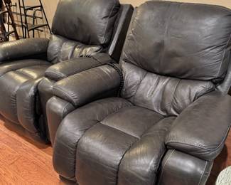 Electric rocking recliners