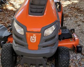 Husqvarna riding lawn mower with only 54 hours on it.