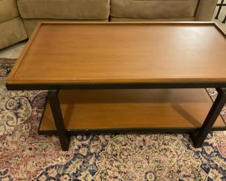 $460 solid wood and metal coffee table with one shelf. Table measures 42 inches wide by 21.5 inches deep by 18 inches high. Available for online purchase.