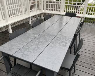 $980 Purchased at Design within Reach Outdoor all-weather plank table by Loll and 8 chairs. (2 captain’s chairs and 6 side chairs) Chairs are Dd Lisboa by Joan Jasper. Table measures 7’11” X 36”w X 29.5”h. Chairs are 16.5”w X 16.75”d X 32.5” h. Captains chairs are 22.5” wide at the arm rests. Available for online purchase