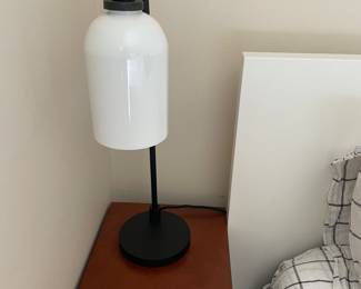 $220 for the pair. One of a pair of pottery barn bedside lamps. The lamps are 24 inches high with a 6 inch diameter base available for online purchase.