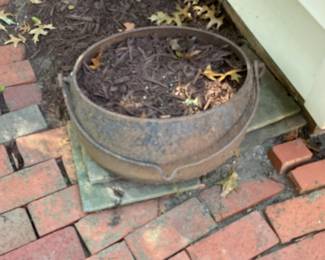 Large cast iron Cauldron Planter.