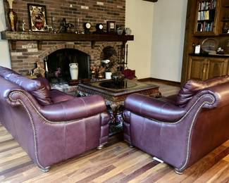 Side/back view of chocolate brown leather sofa & loveseat