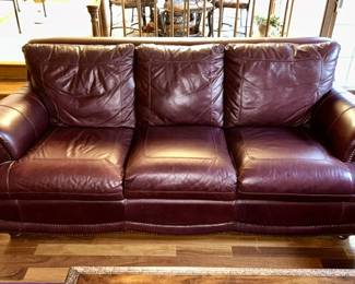 Close-up view of chocolate brown leather sofa