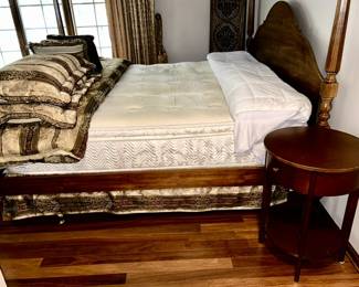 Side view of king-size 4 poster bed with mattress (very clean) and round side table w/ drawer, king-size bedding