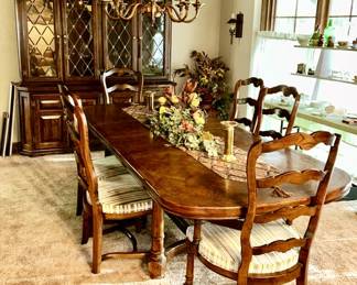 Large dining room table w/ beautiful parquet design top (shown extended with 2 leaves) and 6 chairs and large china cabinet