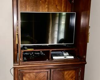Large armoire/entertainment center, flatscreen TV, DVD player