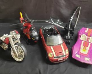 Lot # : 512 - Collectible children's cars, helicopter, and Bratz
