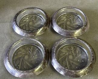 Lot # : 328z - 4 vintage glass coasters w/sterling silver rims

