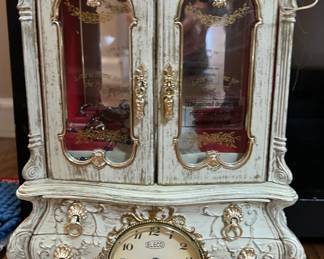 Eleco table top jewelry armoire with clock