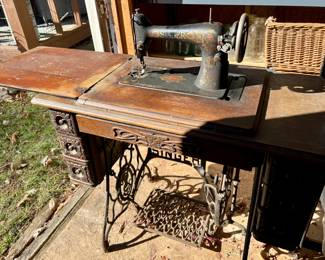 1920s Singer Sewing Machine with treadle cabinet