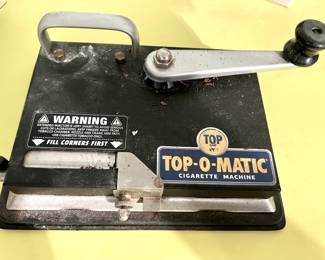 Top-O-Matic cigarette making machine