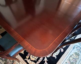 Baker Furniture Historic Charleston Collection Mahogany Georgian Double Pedestal Dining Table with Banding. Measures 68" L x 46" W without Leaves. Extends to 128" with Three 20." Comes With Pads. Photo 4 of 5.