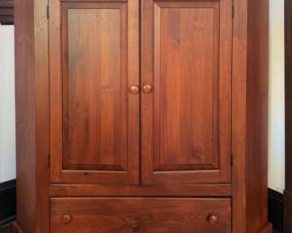 Cherry Finish Corner Media Cabinet. Measures 4' W x 26" D x 48" H. Photo 1 of 2.