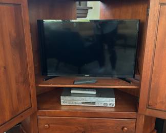 Cherry Finish Corner Media Cabinet. Measures 4' W x 26" D x 48" H. Photo 2 of 2.