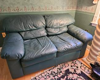 Teal leather loveseat