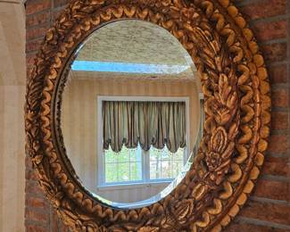 Ornate, gilded mirror