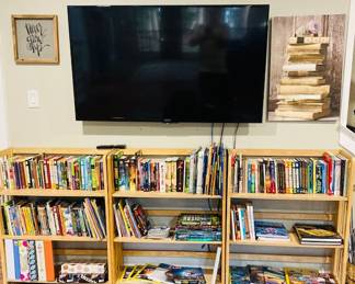 Sony 55" TV. Selection of Hardcover and Paperback Books. Coffee Table Books.