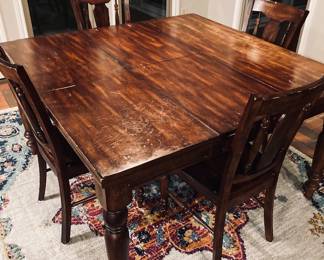 World Market Dining Table and 4 Chairs. Expandable with Butterfly Leaf.
