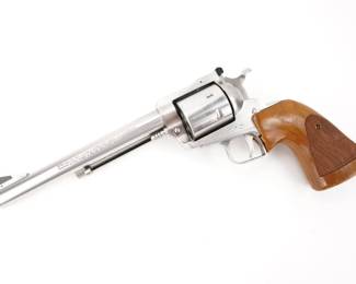 Make: Ruger
Model: New Model Super Blackhawk
Caliber: .44 Magnum
Action: SA
Barrel: 7.5
Bore: Shiny
Serial # 85-16405
Condition: Very Good
Built for hunters, long-range competitors and collectors, the Ruger New Model Super Blackhawk .44 Remington Magnum Revolver is a single-action revolver that packs up to 6 rounds. It's crafted with a 7.5-inch cold hammer-forged, rifled barrel and a Western-style hardwood grip and features a fixed ramp front sight and an adjustable rear sight. The revolver is in very good condition, showing normal signs of use and wear.