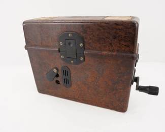 Make: German
Model: Field Telephone "Feldfer
The feldfernsprecher (field telephone) 33 (FF33) was the standard field telephone of the German military forces of WWII. It is a general purpose field telephone designed for wired communications. It was introduced in 1933 as a modern replacement for the previous WWI legacy field telephones the last of the series being the feldfernsprecher 26 (1926). The FF33 can also be connected to the Torn. Fu. D2 and Torn. Fu. Bl, and F series radio sets to act as a remote handset. Ingeniously designed with what appears to be one traditional wartime style handset, the lid interior of one has built in electrical circuit schematics for informational purposes. Used by the German Army throughout WW2 and continued in service for another 25 years into the Cold War era. This example is from 1943. Excellent condition. 