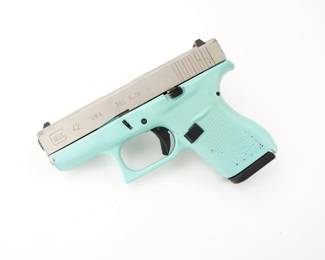 Make: Glock
Model: 42
Caliber: .380 Auto
Action: Semi
Barrel: 3
Bore: Shiny
Serial # ACSN487
Condition: Very Good
For those discerning shooters who desired the smallest GLOCK possible, the company responded with the now popular G42 in 380 AUTO with ultra-compact dimensions and easy-to-shoot characteristics. The G42 packs all the features GLOCK customers have come to appreciate - from the GLOCK SAFE ACTION system with its multiple integrated safety features to the brand’s proven reliability and durability. Finished in Tiffany blue and sold with one magazine, the pistol is in good condition showing normal signs of use and wear. 