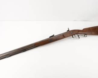 Make: Thompson Center
Model: Black Powder
Caliber: 50 BP
Action: Percussion
Barrel: 26
Bore: Dark
Serial # K10306
Condition: Great
Country: Rifle
Thompson Center got into the black powder business in 1970, with their Hawken rifle. These were the best black powder rifles on the market. Nearly no one made high quality black powder guns. since then have made a variety of rifles. This Rifle features a 23" barrel chambered in .50 cal and remains in very good condition. This rifle shows normal signs of use and wear. 