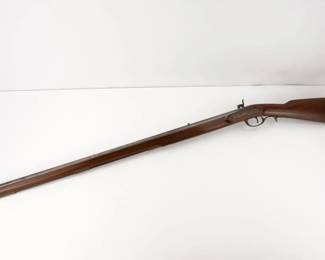 Make: Kentucky Style
Model: Black Powder
Caliber: 50 BP
Action: Percussion
Barrel: 34
Bore: Dark
Serial # 24690
Condition: Very Good
The Kentucky Rifle matches classic beauty with outstanding performance. The octagonal barrel is rifled 1:66" for patched-ball loads. The long sighting plane between the blade front sight and fixed notch rear sight adds precision shooting accuracy. The color case hardened lock features a V-type mainspring for fast lock time. The full-length two piece stock of walnut-finished select hardwood is accented by solid brass furniture. This Rifle remains in very good condition showing normal signs of use and wear.