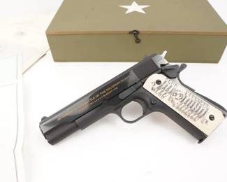 Make: Colt
Model: 1911 Battle Of Solomon
Caliber: .45 ACP
Action: Semi
Barrel: 5
Bore: MInty
Serial # FR15015
Condition: Excellent
The faux ivory grips are excellent. The left grip is marked with a commemorative scene & wording. The right grip is marked ''WWII 50th Anniversary'' around the Rampant Colt logo. The left side of slide is marked in three lines 'IN HONOR OF THE BATTLE OF THE SOLOMON ISLANDS 7 AUGUST 1943 **** 5 AUGUST 1945''. The right side of the slide is stamped “ GOVERNMENT MODEL’ and the right side of the frame is stamped “SI-035”. Bore is excellent. Factory sights. Comes in an American Historical Foundation World War II Footlocker Wooden Commemorative box and is sold with all of the original and corresponding paperwork.