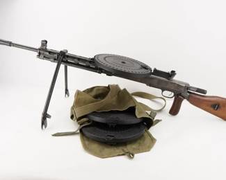 Make: BW Customs
Model: DP-28
Caliber: 7.62x54
Action: Semi
Barrel: 28
Bore: Shiny
Serial # RA0120
Condition: Very Good
The Degtyaryov machine gun or DP-27/DP-28 is a light machine gun firing the 7.62×54mmR cartridge that was primarily used by the Soviet Union, with service trials starting in 1927, followed by general deployment in 1928. This converted rifle features a 28" barrel and is sold with 3 drum mags and original case for the mags. 