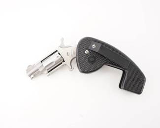 Make: North American Arms
Model: HG
Caliber: .22 LR
Action: SA
Barrel: 2
Bore: Shiny
Serial # G51355
Condition: Very Good
NAA mini-revolvers pack a punch, with a cylinder capacity of five rounds.This variation includes the HG or hand grip modification that folds up and conveniently clips into your pocket or purse. Chambered in .22LR this revolver is in very good condition, showing minimal signs of use and wear. 