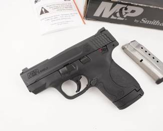 Make: Smith & Wesson
Model: M&P Shield 9
Caliber: 9mm
Action: Semi
Barrel: 3
Bore: Shiny
Serial # JCE2686
Condition: Very Good
Country: Pistol
Smith & Wesson’s popular M&P Shield Semi-Auto Pistol operates with a striker-fired action, eliminating any external hammer to catch on clothing when this handgun is concealed. The thin 1" profile aids with concealment. The operation is based on a polymer frame and coated stainless steel action. Other features of the S&W M&P Shield pistol are white dot rear and front sights, 2-piece trigger, textured grip, extended magazine that increases grip surface, and rounded features to make the handgun more concealed carry oriented. The pistol is sold with a factory box and one magazine and is in excellent condition. 