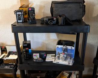 Assortment of vintage cameras from 1940-current.
Lots of asserories