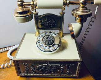 Deco-Tel French Provincial Style Gold and Brass Rotary Telephone.