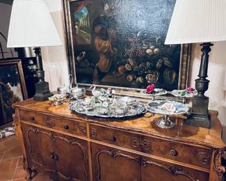 The paintings in this home are stunning.  Original artwork, Large 1960's Buffet, Sandalwood.